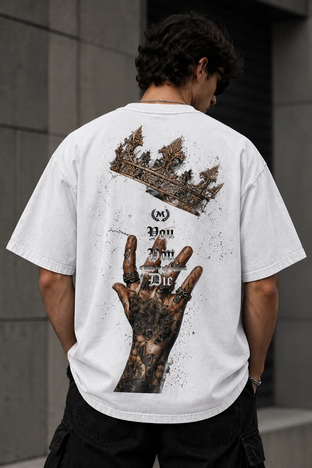 Black and white oversized T-shirts featuring a crown, gothic lettering, and a tattooed hand graphic on the back.