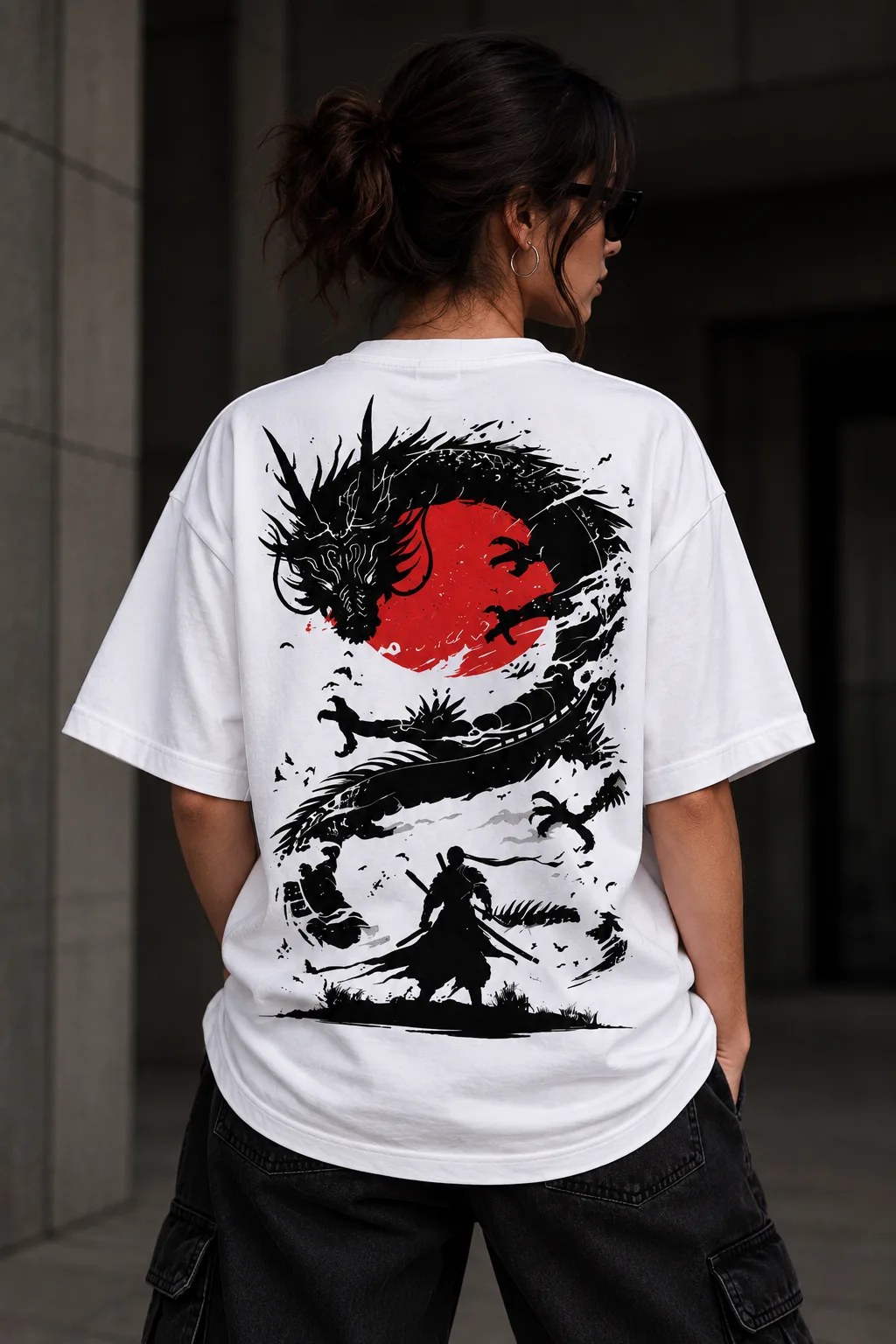 Black and white oversized T-shirts featuring a Japanese-inspired dragon, red sun, samurai silhouette, birds, and dynamic ink artwork on the back.